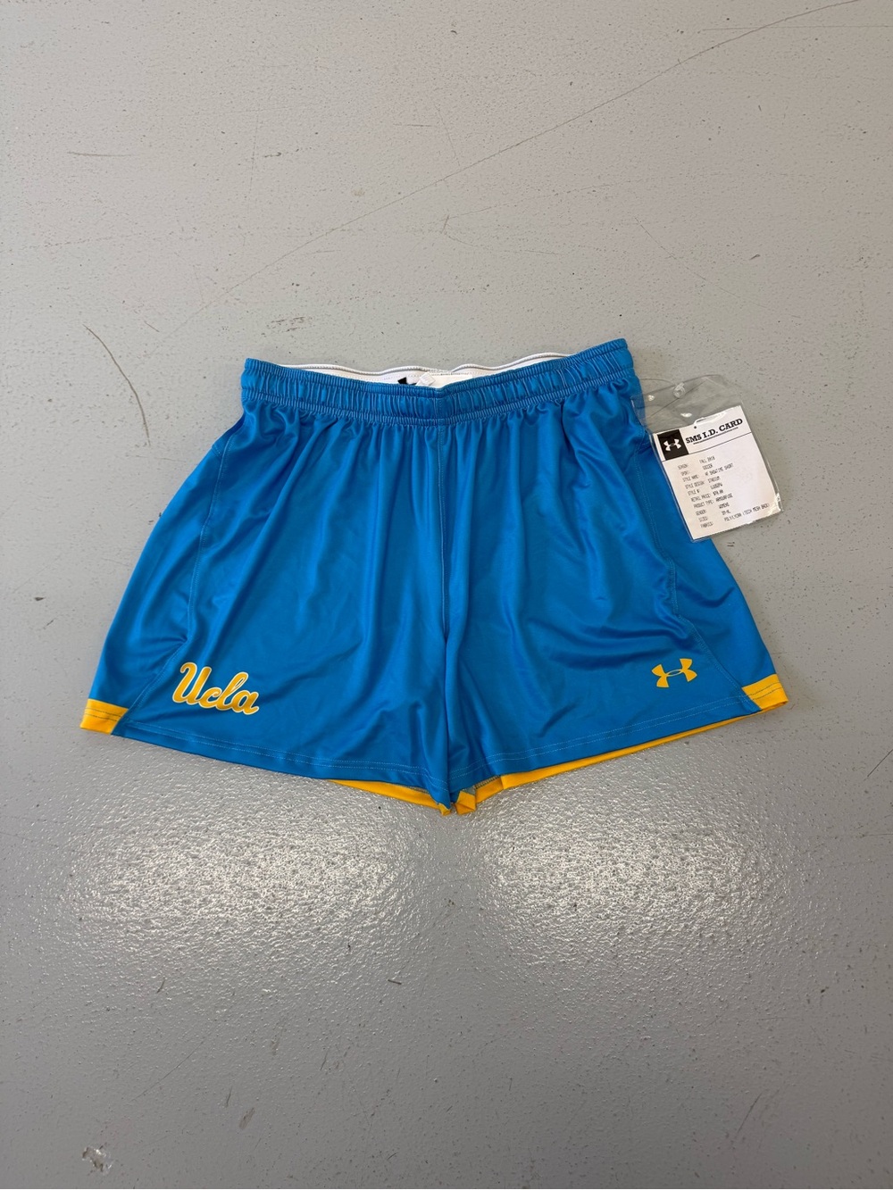 Under Armour UCLA Blue Athletic Shorts with Yellow Trim
